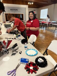 JLA Member Farrah Shah Volunteering at Mum Making with Amarillo Children's Home